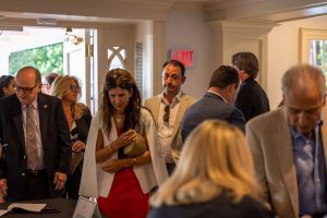 People mingling at indoor networking event