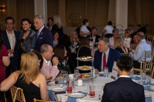 Guests mingling at formal banquet reception