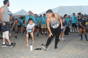 Runners stretching before race at outdoor event