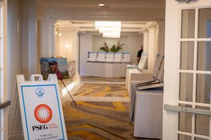 Conference registration area with PSEG signage